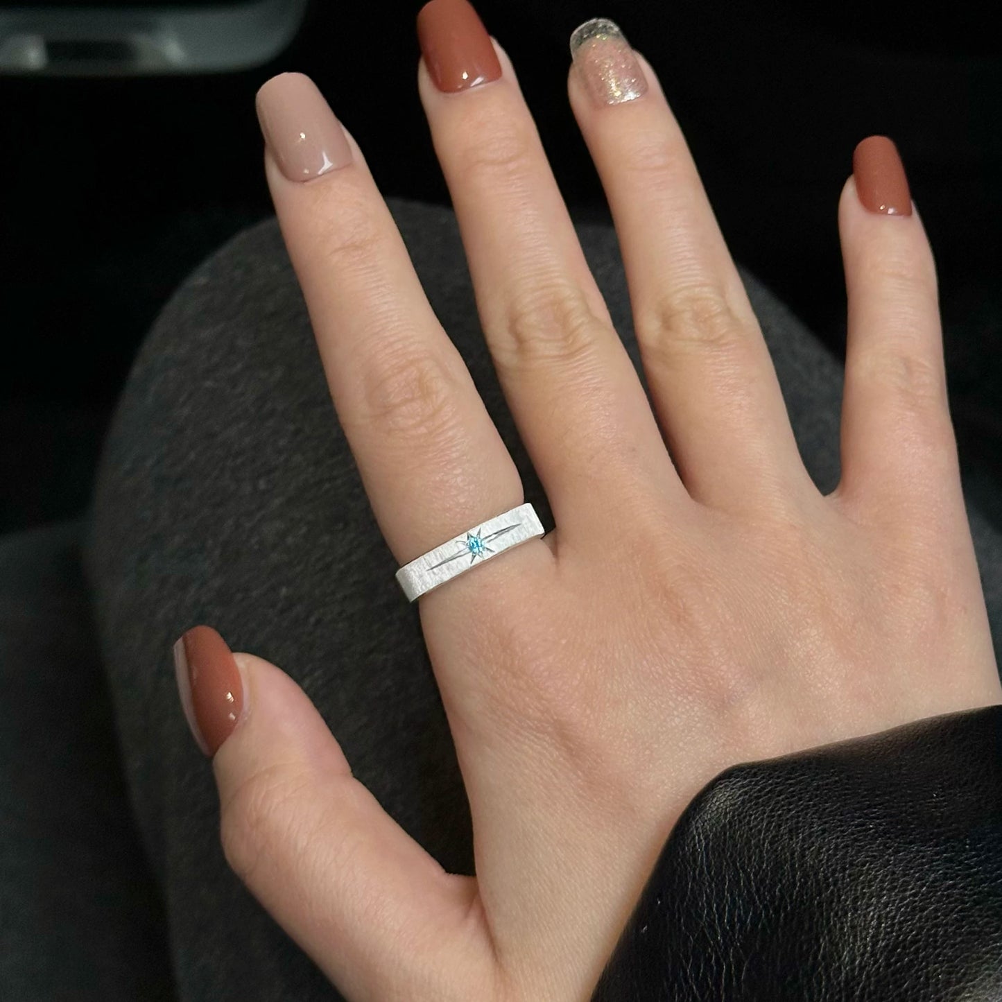 The Polaris Glacial Ice Band – Artisan Brushed Ring with Icy Blue Starburst