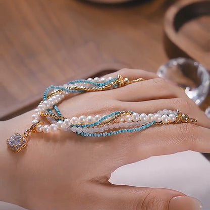 Handmade turquoise, pearl, and diamond bracelet
