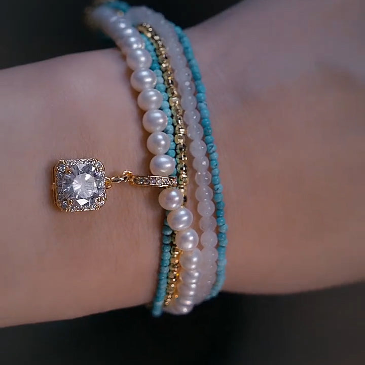 Handmade turquoise, pearl, and diamond bracelet