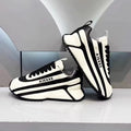 Black and white striped arch support athletic shoes
